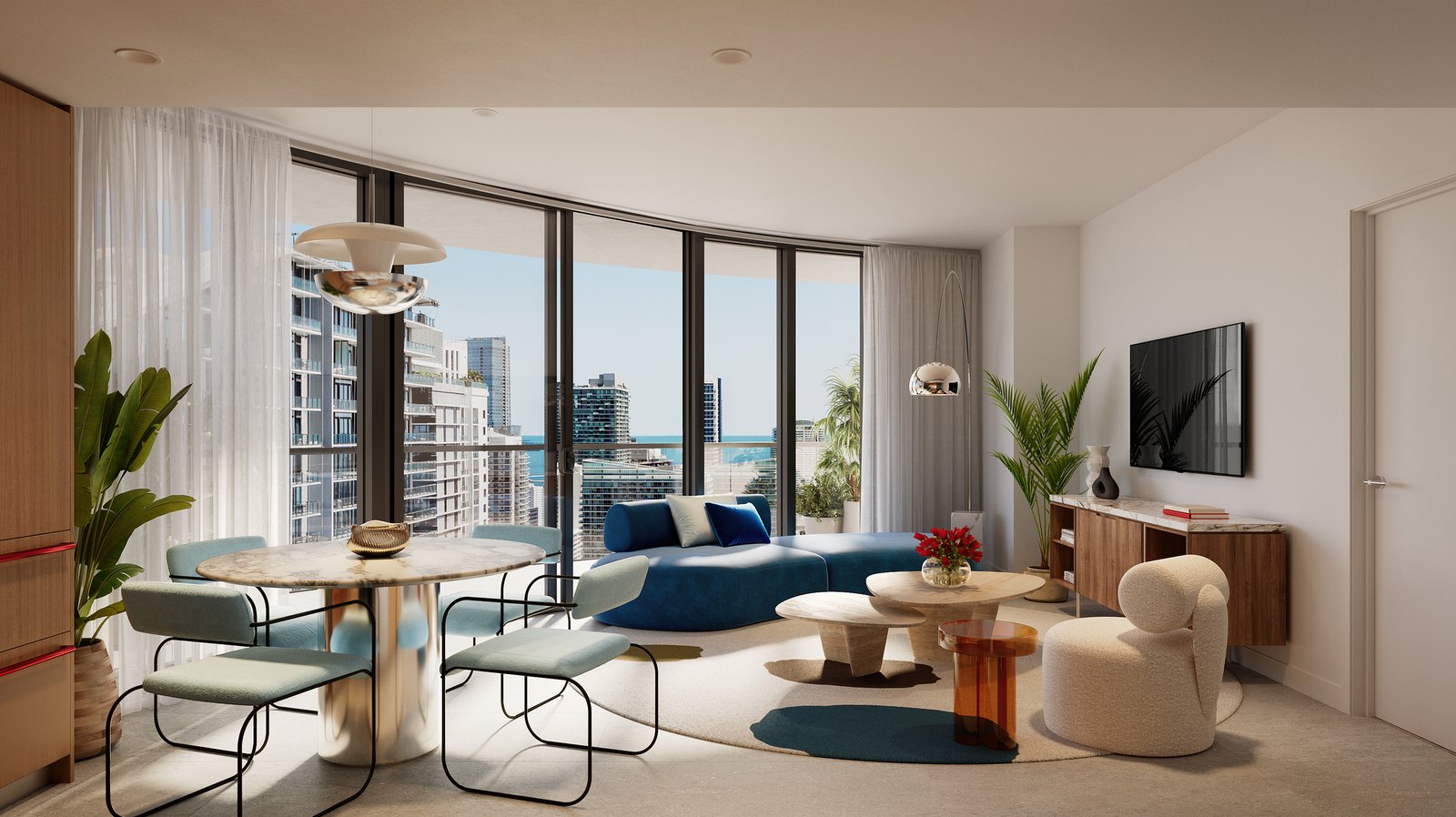 Light-filled luxury condominium living room with floor-to-ceiling windows overlooking the Brickell skyline and Biscayne Bay